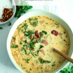 bowl and surrounding of zuppa toscana soup