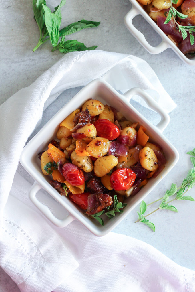 sheet pan gnocchi and sausage in bowl