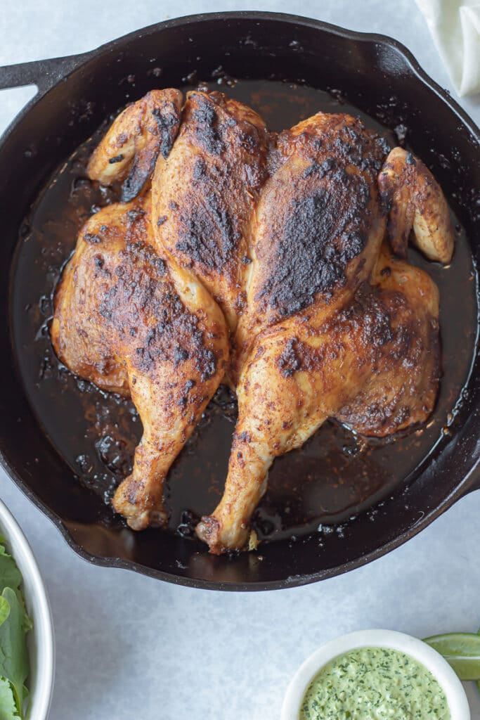 peruvian style roast chicken on pan