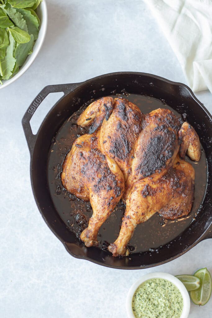 spiced roast chicken in cast iron pan