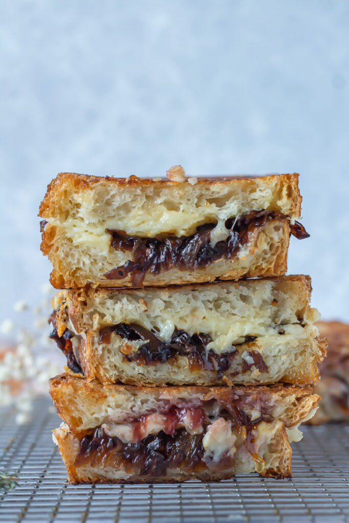 stacked grilled cheese sandwiches with caramelized onion jam