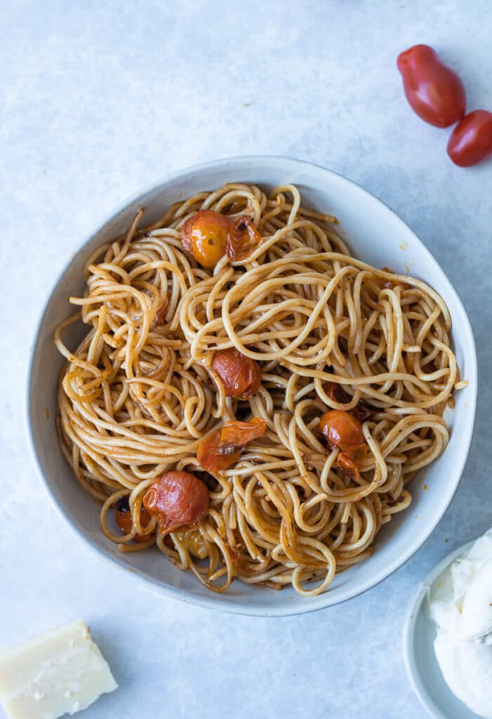 brown butter pasta with cherry tomatoes in bowl