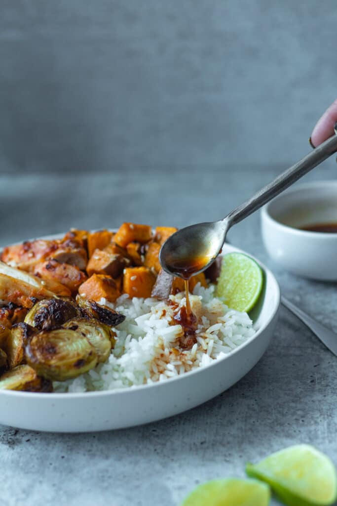 sauce poured on rice with vegetables