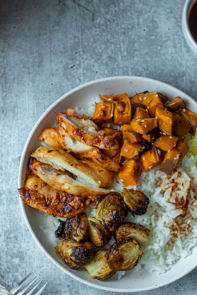 bowl of cooking for one sheet pan chicken and vegetables