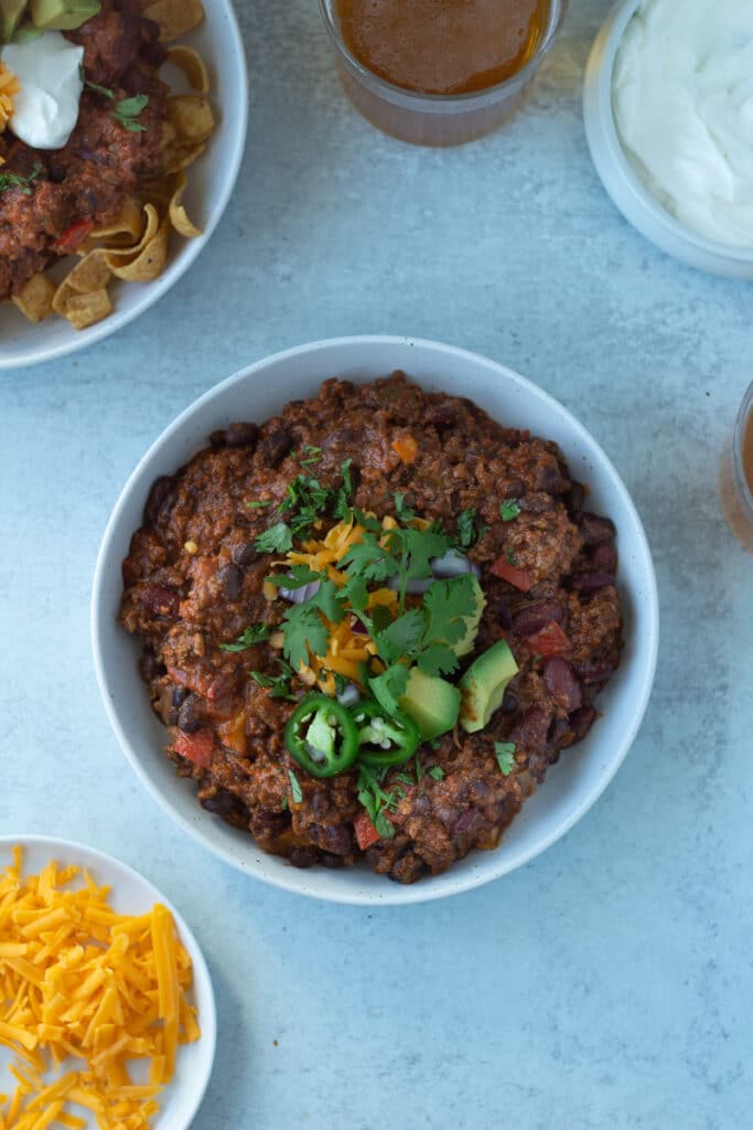 bowl of chili with toppings