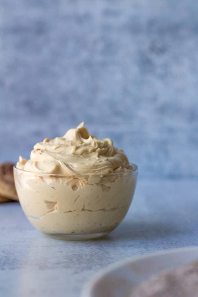 glass bowl of caramelized white chocolate buttercream filling