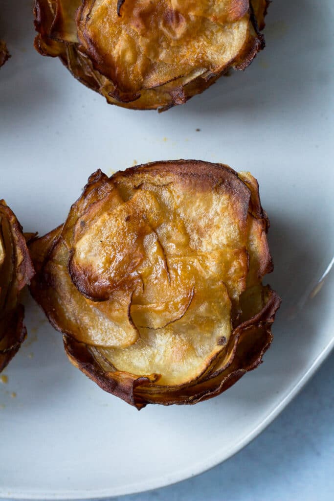 Close up of roasted potato stack on plate