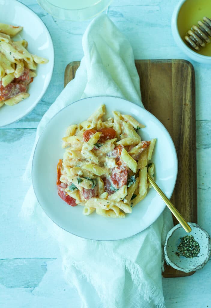 Overhead shot of tomato and feta pasta