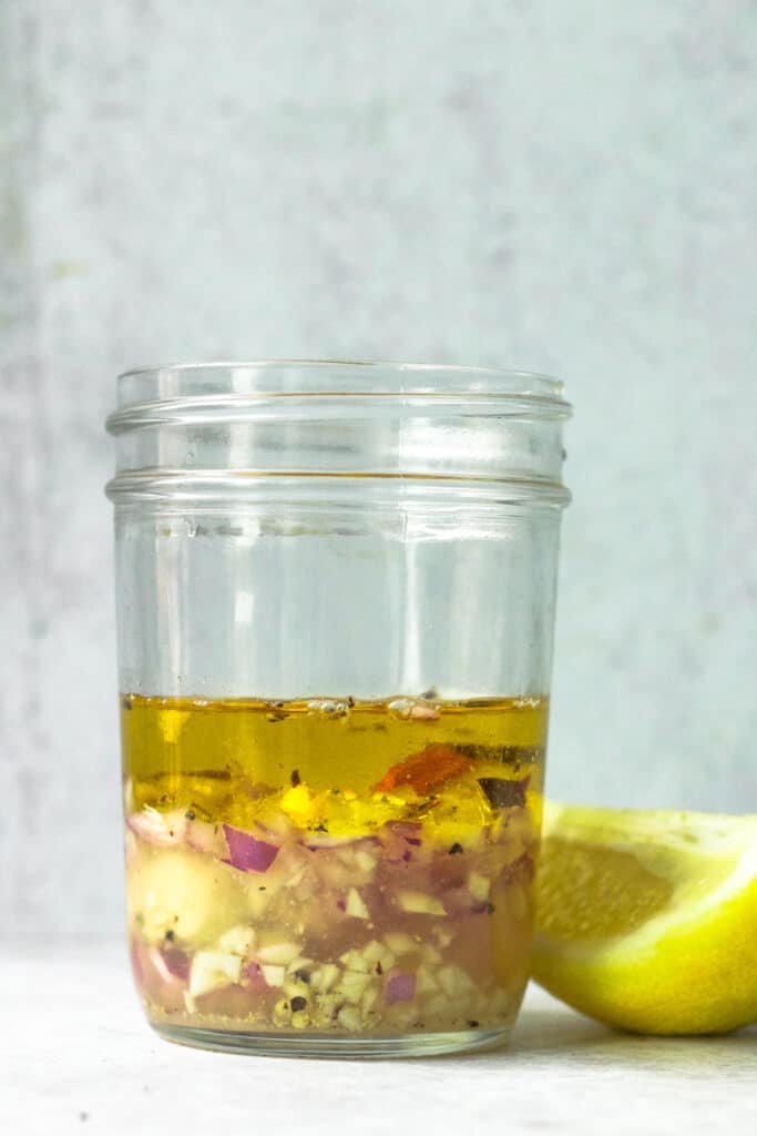 lemon garlic vinaigrette ingredients in jar