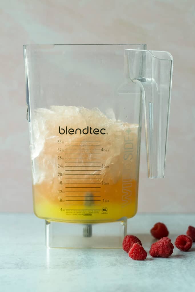 blender with raspberry limoncello frosé ingredients