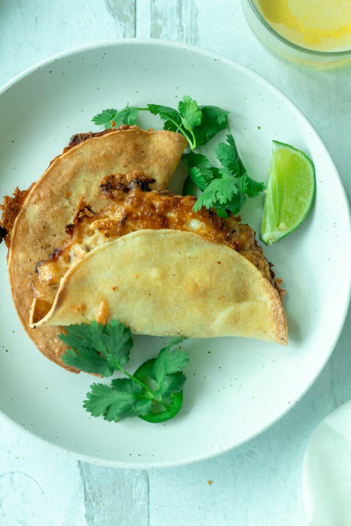 Finished baked chicken tacos on plate