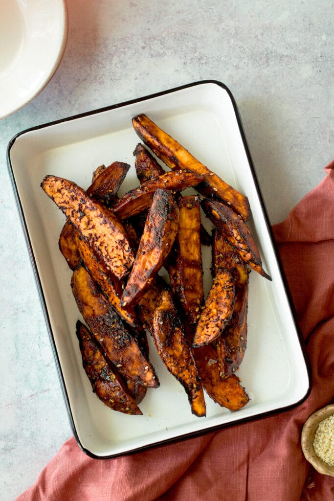 finished roasted sweet potatoes in baking dish