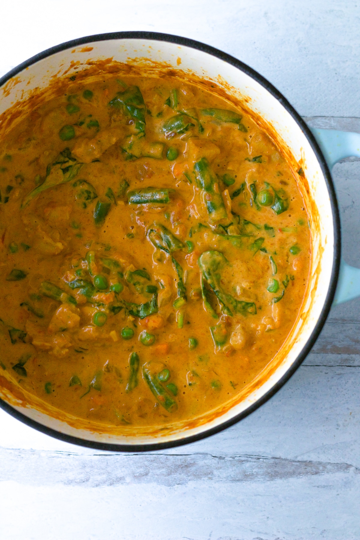 Curry chicken pot pie filling in pot.