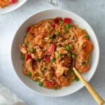 bowl of cajun orzo with shrimp