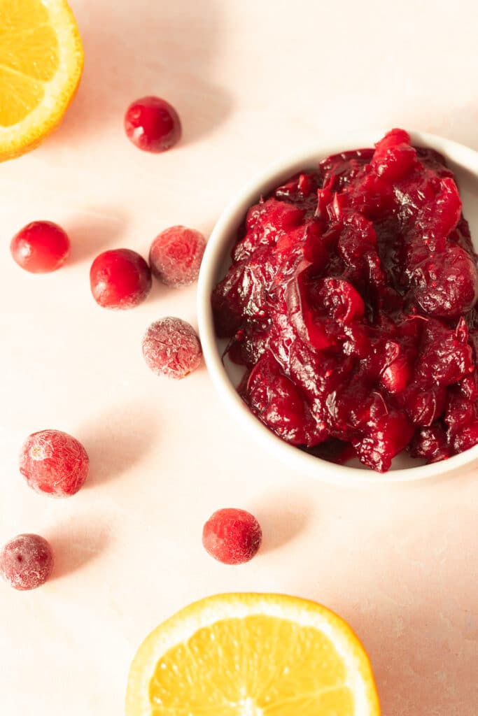 small bowl of cranberry sauce with frozen cranberries