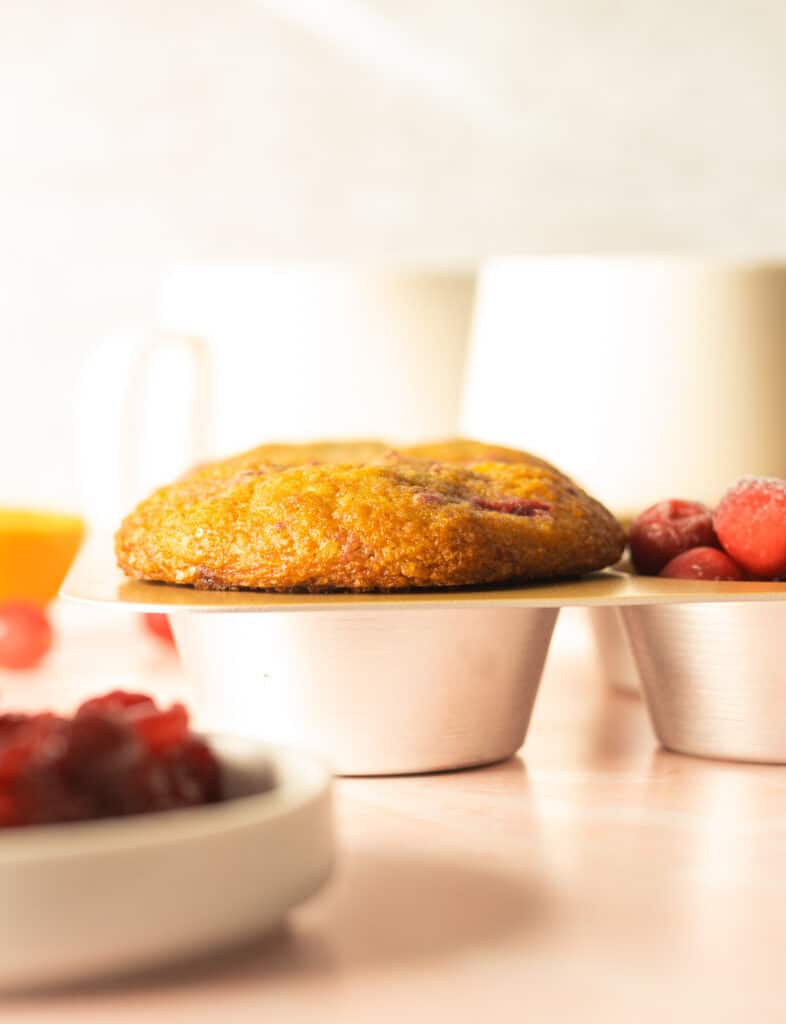 muffin top in pan with coffee cup