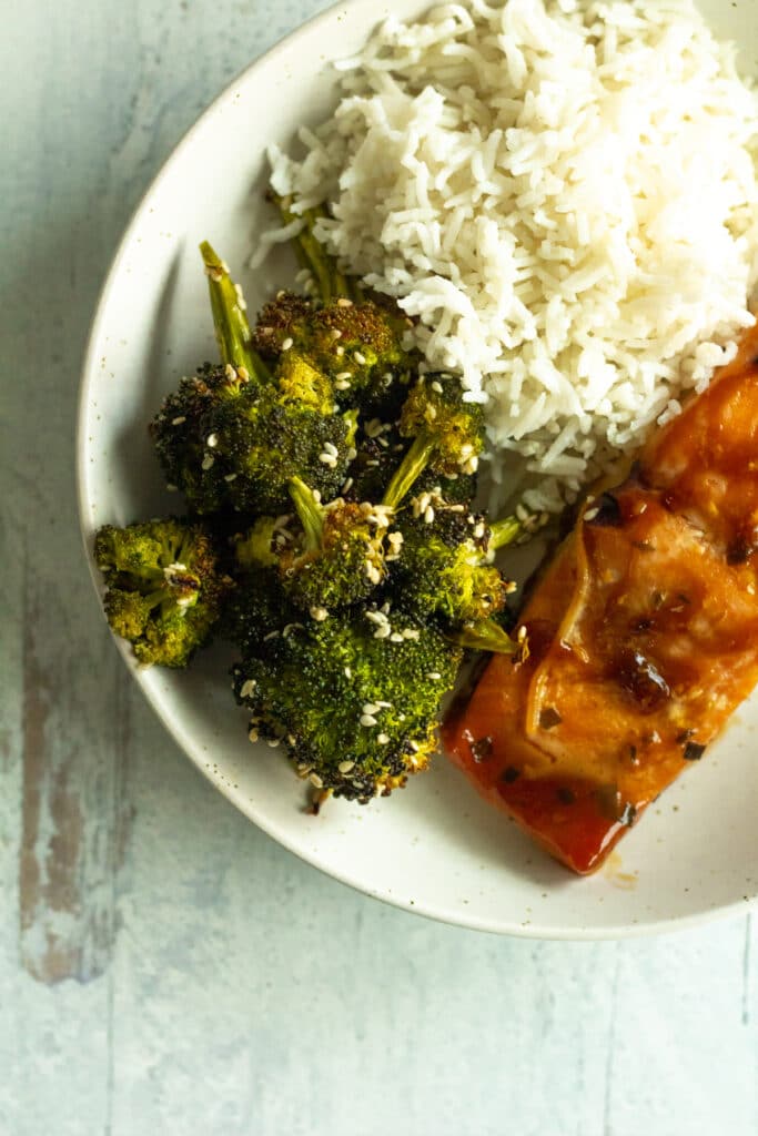 broccoli on dinner plate with salmon