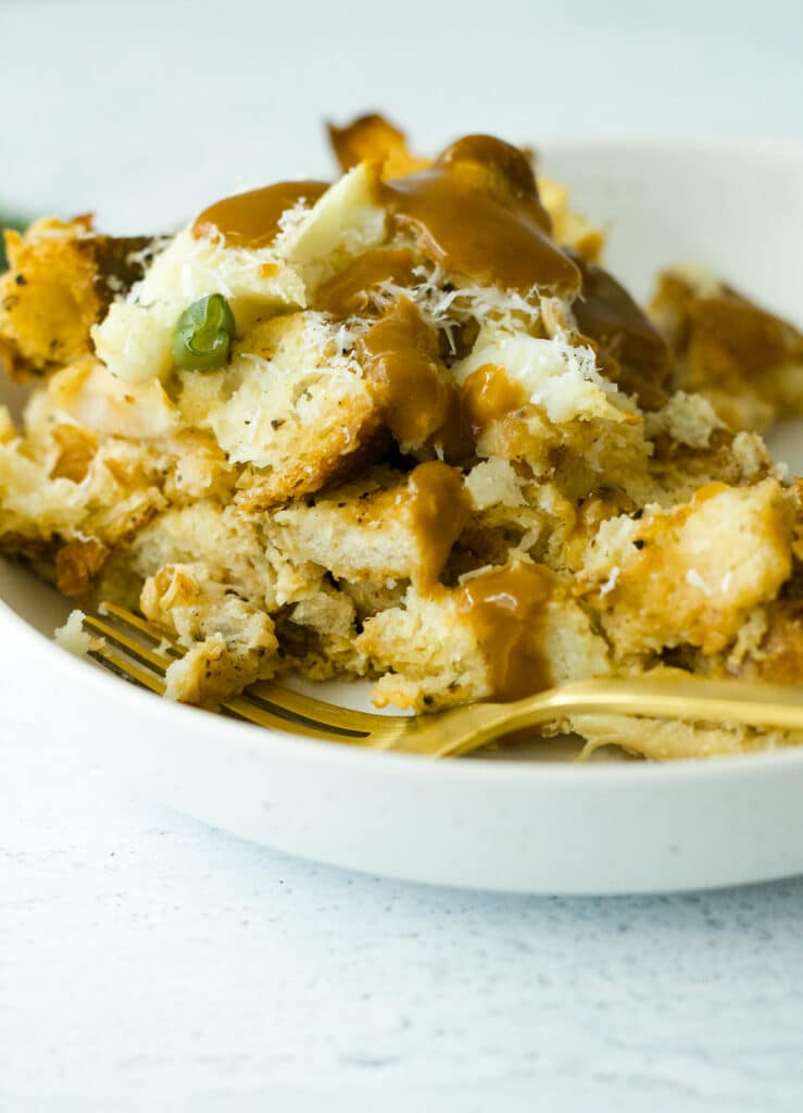 close up shot of strata on plate with fork