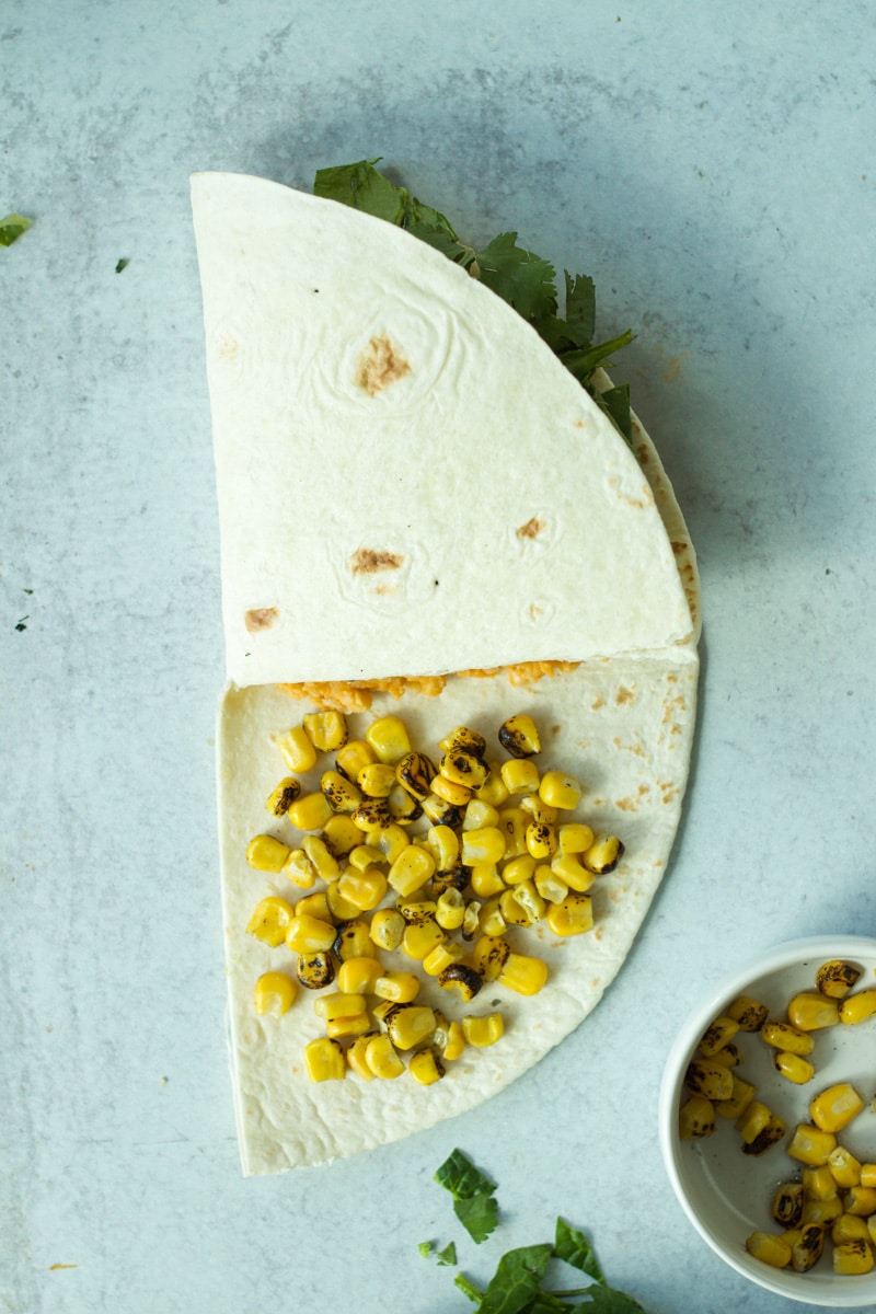 Second fold of buffalo chickpea wrap.