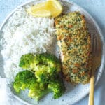 plate with finished salmon, rice and broccoli