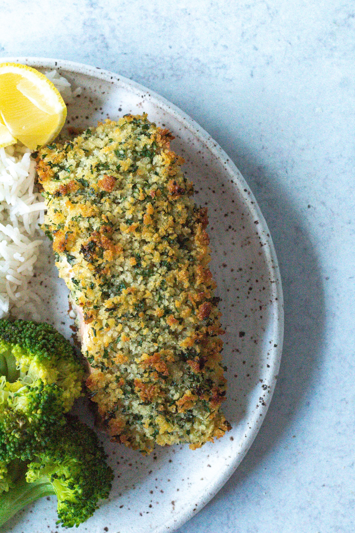 finished crispy baked herb crusted salmon.