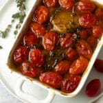 Finished cherry tomato confit in baking dish.