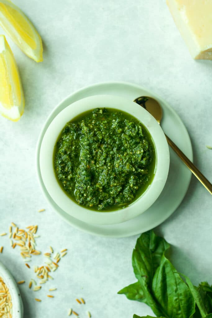 A small bowl of nut-free pesto with lemon and basil.