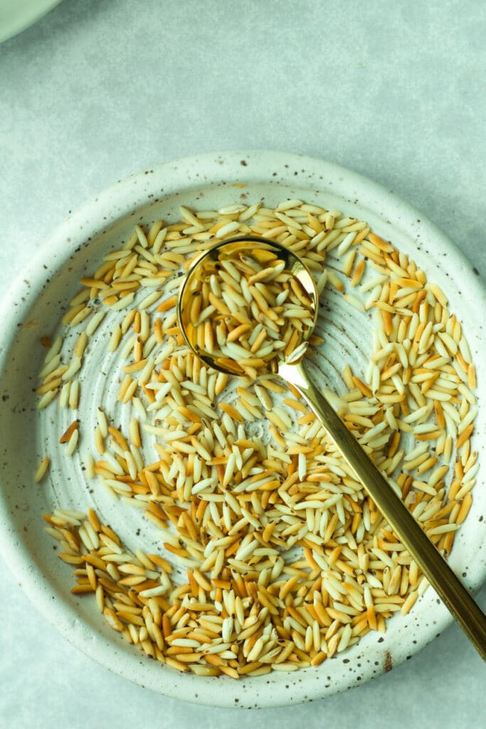 Toasted rice on small plate.