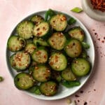 Spicy asian cucumber salad on plate.