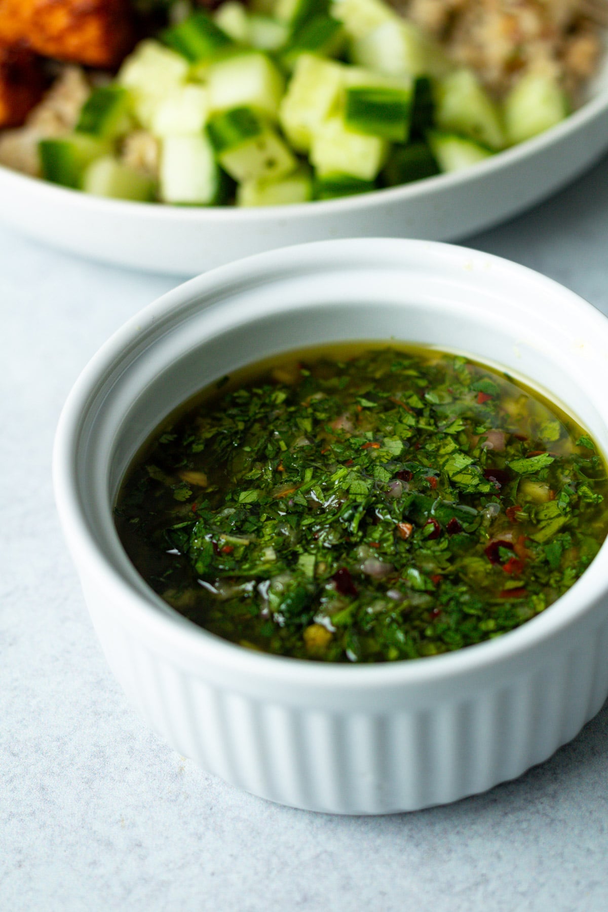 Cilantro chimichurri in ramekin.