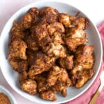 Chicken bites on plate with fork.